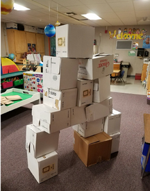 A fort of Vino Noceto boxes at Preschool