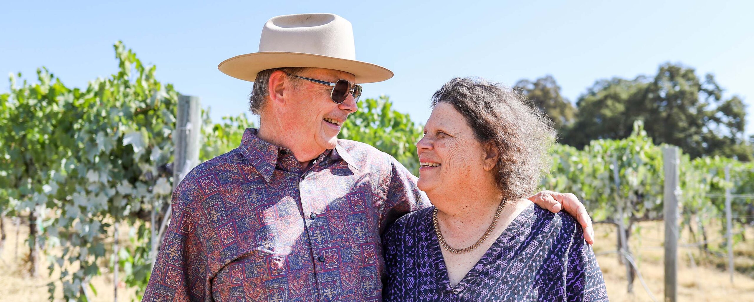 Suzy and Jim Gullett in the Hillside Sangiovese Vineyard